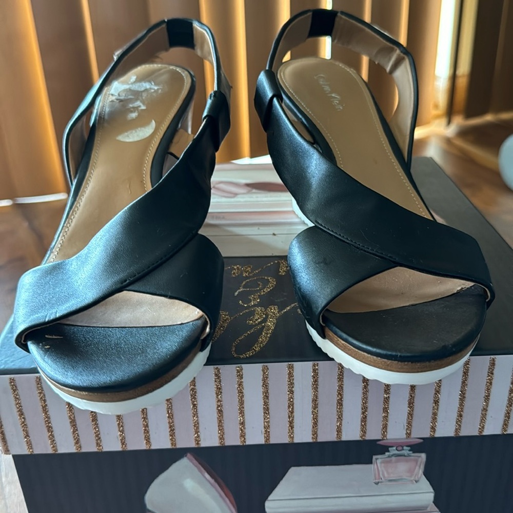 Women brand new Calvin Klein wedge sandals.